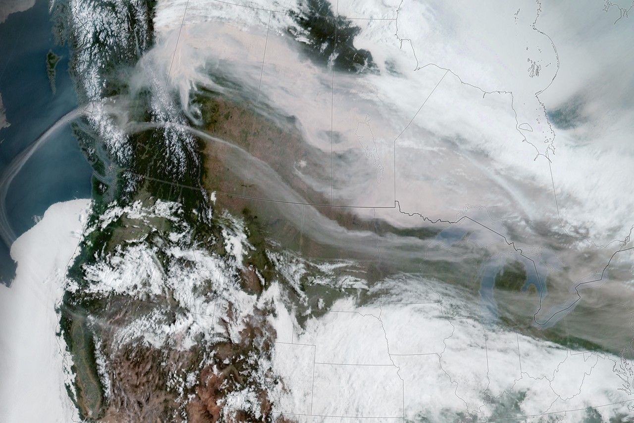 GOES-18 geostationary satellite image showing Canadian wildfire smoke sweeping across multiple U.S. states, May 2023